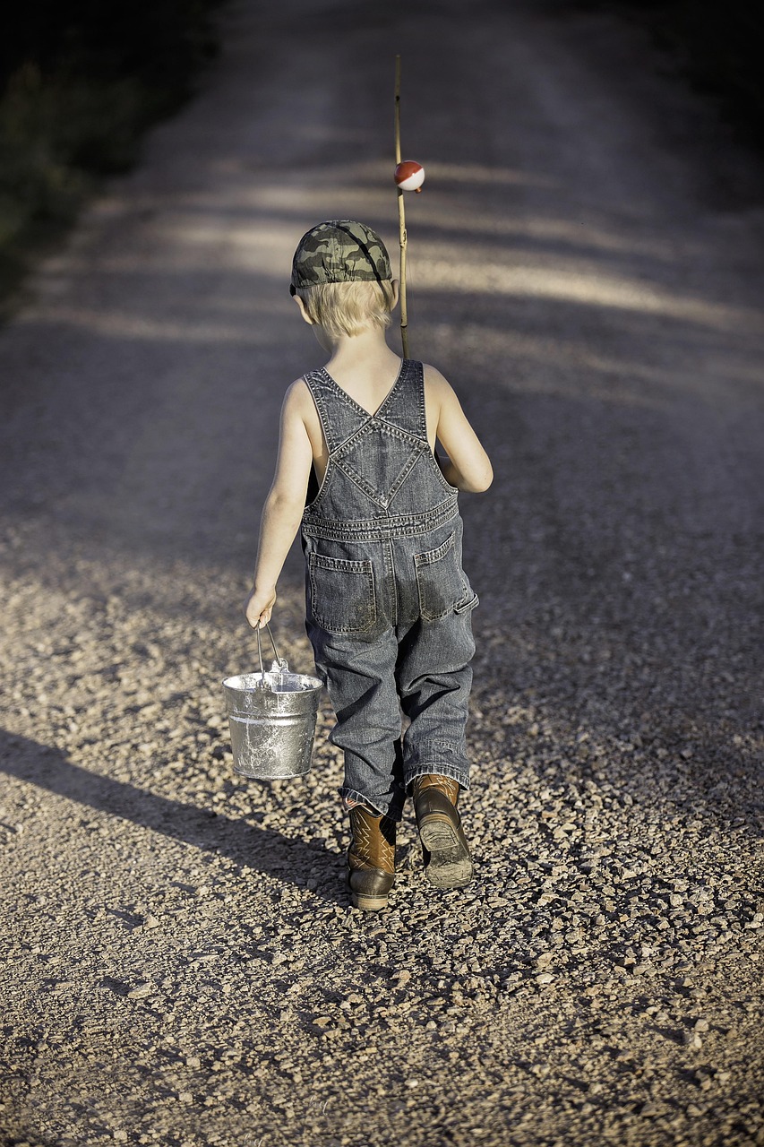 about-img-01 boy, child, fishing rod, bucket, fishing, fisherman, kid, young, small, nature, childhood, walking, summer, adventure, lifestyle, outdoors, back view